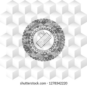 keyboard icon inside grey icon or emblem with geometric cube white background
