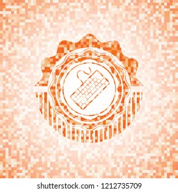 keyboard icon inside orange mosaic emblem with background