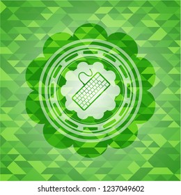 keyboard icon inside realistic green mosaic emblem