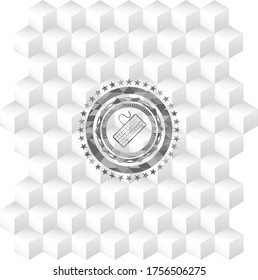 keyboard icon inside realistic grey emblem with geometric cube white background. 