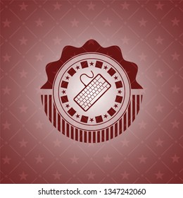 keyboard icon inside red emblem