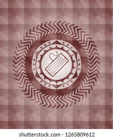 keyboard icon inside red seamless badge with geometric background.