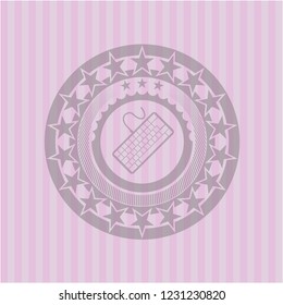 keyboard icon inside retro style pink emblem