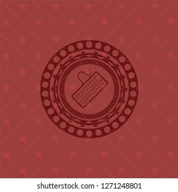 keyboard icon inside retro style red emblem