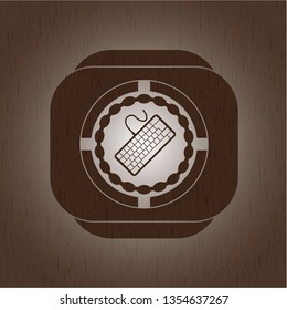 keyboard icon inside retro style wooden emblem