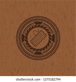 keyboard icon inside retro wood emblem