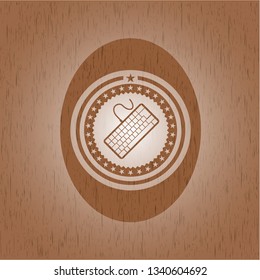 keyboard icon inside retro wooden emblem