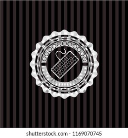 keyboard icon inside silver badge