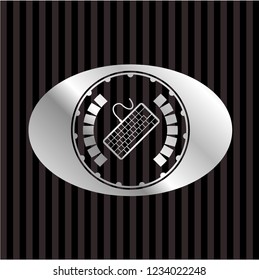 keyboard icon inside silver emblem