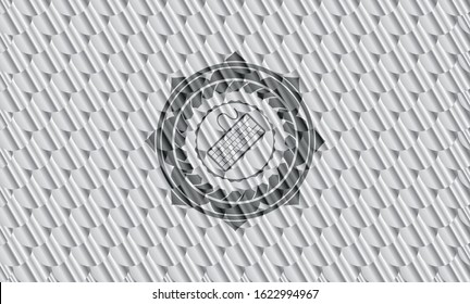 keyboard icon inside silver emblem. Scales pattern. Vector Illustration. Detailed.
