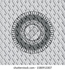 keyboard icon inside silver shiny badge. Scales pattern. Vector Illustration. Detailed.