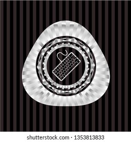 keyboard icon inside silvery shiny emblem