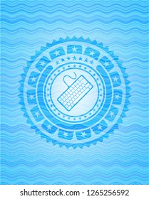 keyboard icon inside sky blue water wave emblem background.