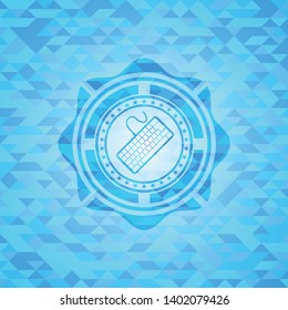 keyboard icon inside sky blue emblem with mosaic ecological style background