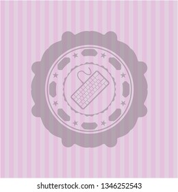 keyboard icon inside vintage pink emblem