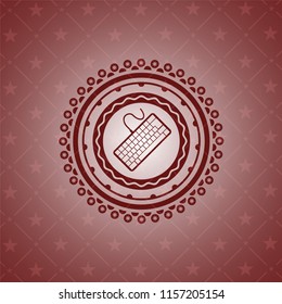 keyboard icon inside vintage red emblem