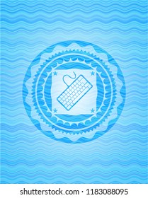 keyboard icon inside water concept badge background.