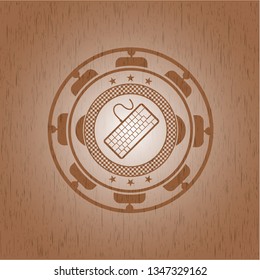 keyboard icon inside wood badge or emblem