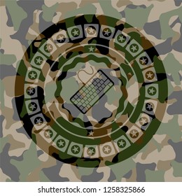 keyboard icon on camouflage texture