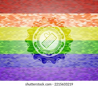 keyboard icon on mosaic background with the colors of the LGBT flag. 