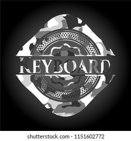 Keyboard on grey camo pattern