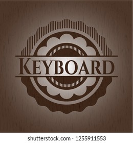 Keyboard wood emblem