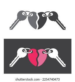 Keychain with key ring, two keys and a heart locket.