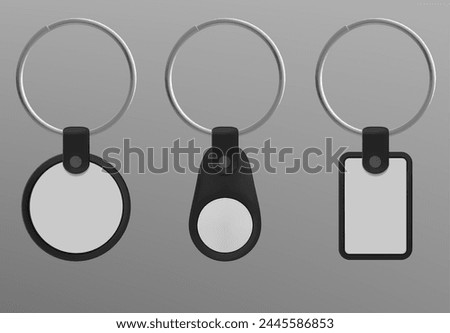Keychain on metal ring realistic 3d vector set. Black leather and white plastic key holder mockup. Different shapes of pendant label souvenir for branding design. Template of trinket accessory.