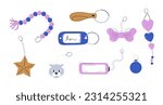 Keychains set. Key ring. Collection of pendants in shape of bow, cat, hearts, chain. Trinkets, keyholders and keyrings collection 