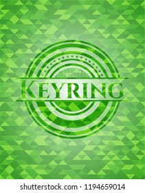 Keyring green emblem with triangle mosaic background