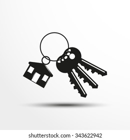 Keys with a decorative trinket. Vector illustration.