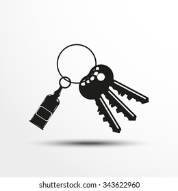 Keys with a decorative trinket. Vector illustration.