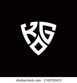 Logo de KG monograma con plantilla de diseño de estilo escudo moderno aislado en fondo negro