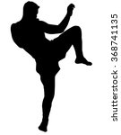Kickbox fighter preparing to execute a high kick