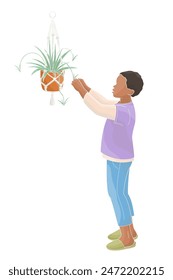 kid African American character boy and houseplant chlorophytum in a hanging pot