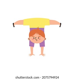 Kid boy standing on hands, flat cartoon vector illustration isolated on white background. Children gymnastic practice and sport physical education personage.