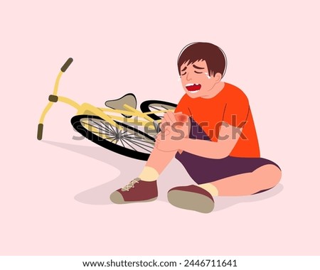 Kid hurts his knee after falling off his bicycle.