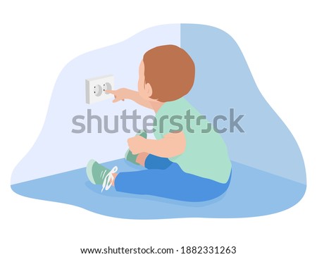 The kid left alone sits on the floor and touches the socket with his fingers. Accident prevention, safety concept