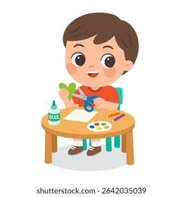 Kid Making Paper Craft with Scissors and Glue. Child Cutting Paper Heart in Art Class Activity. Preschool Boy Enjoying Arts and Crafts at Desk. Kids Creativity,  Education Concept.