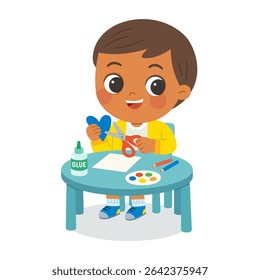 Kid Making Paper Craft with Scissors and Glue. Child Cutting Paper Heart in Art Class Activity. Preschool Boy Enjoying Arts and Crafts at Desk. Kids Creativity,  Education Concept.