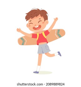 Kid playing with cardboard plane toy vector illustration. Cartoon cute boy flying with craft wings, airplane travel of happy preschool child, dream adventure of small aviator isolated on white