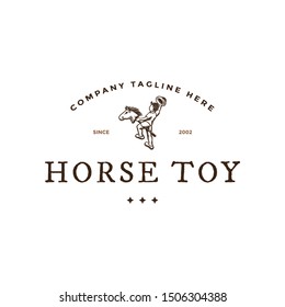 Kid playing horse toy like cowboy logo