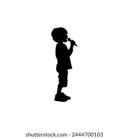 Kid singing karaoke, funny singing, child with microphone singing black silhouette	