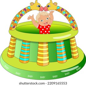 The kid stands on an inflatable arena with two giraffes, raised his hands up and smiles.