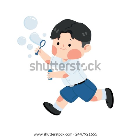 Kid student blowing soap bubbles