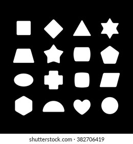 Kid toys geometric shapes silhouettes. White on a black background.