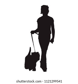 Kid walking dog, isolated vector silhouette, front view
