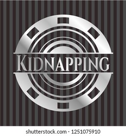 Kidnapping silver emblem or badge