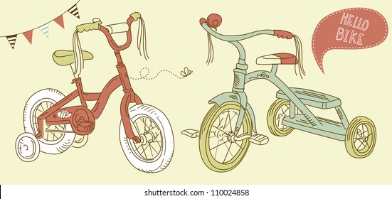 Kids bicycles, a girls bike and a tricycle