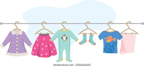 Kids Clothes Hanging on a Line Outside To Dry